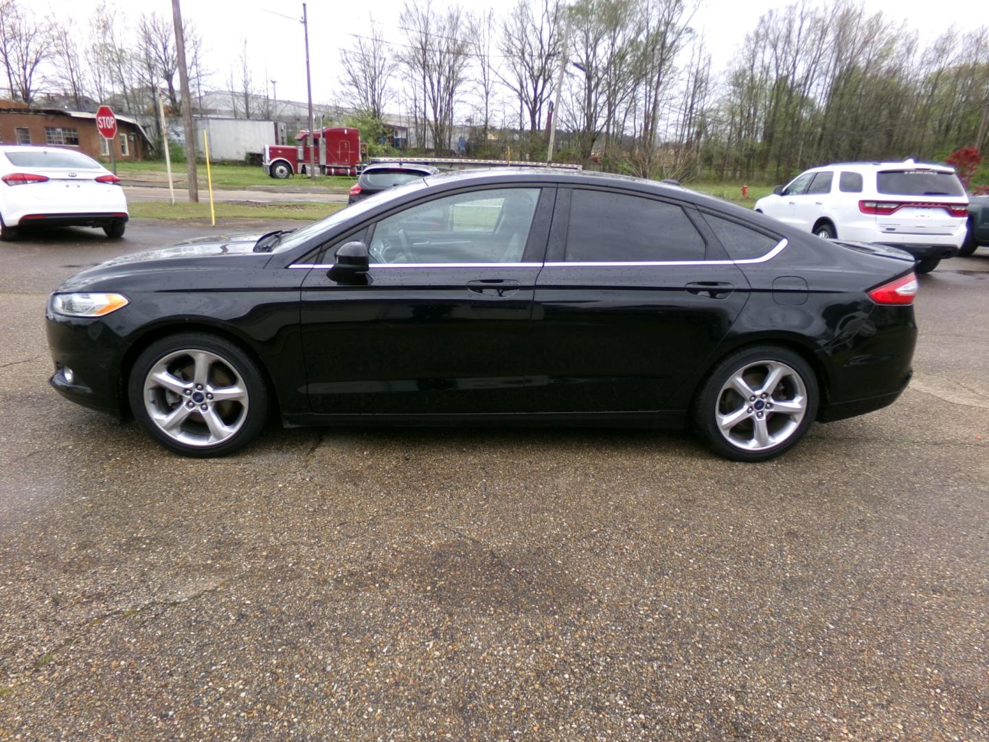 2016 Ford Fusion S (3FA6P0G71GR) with an 2.5L L4 DOHC 16V engine, 6-Speed Automatic transmission, located at 401 First NE, Bearden, AR, 71720, (870) 687-3414, 33.726528, -92.611519 - Photo#1